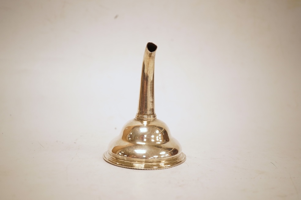 A George III small silver wine funnel (lacking strainer), maker's mark rubbed, London, 1767, 9.9cm, 52 grams.